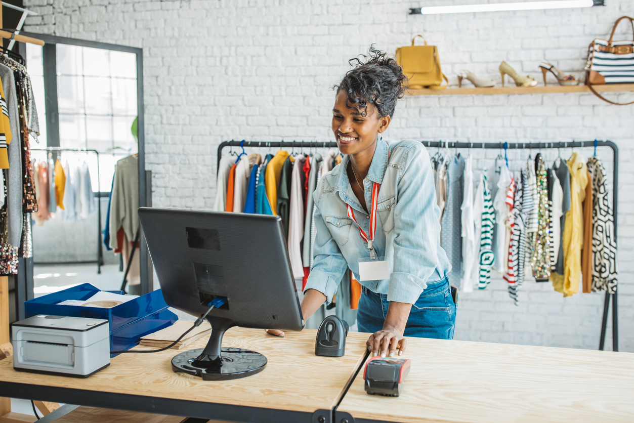 Woman Working at a Modern Thrift Store